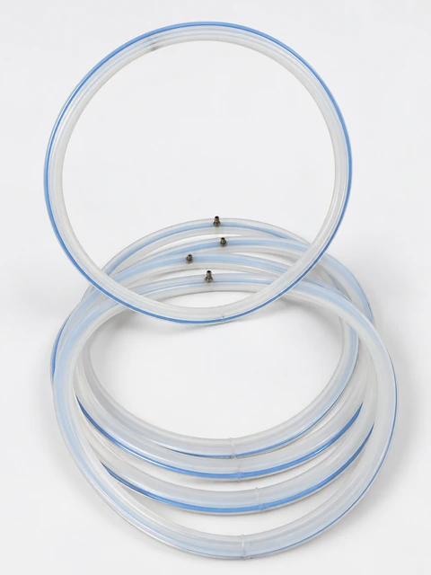 Translucent ring seals with blue stripes and visible air valves, with one ring upright.