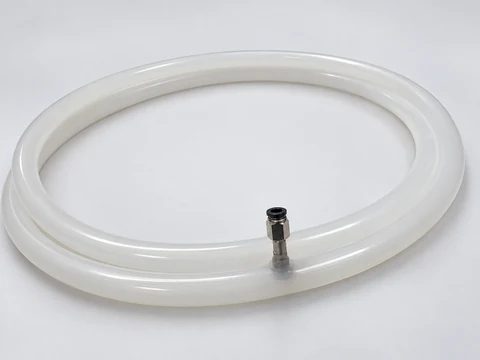 Translucent seal showing its metal air fitting, wide ring body and circumferential groove.